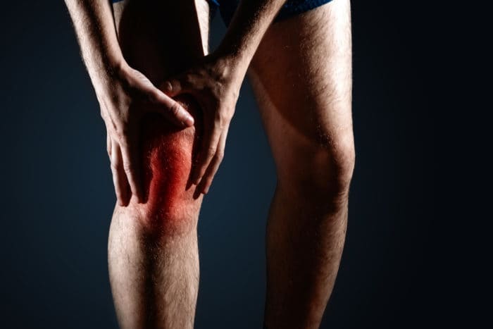 symptomen van ontsteking van het kniegewricht