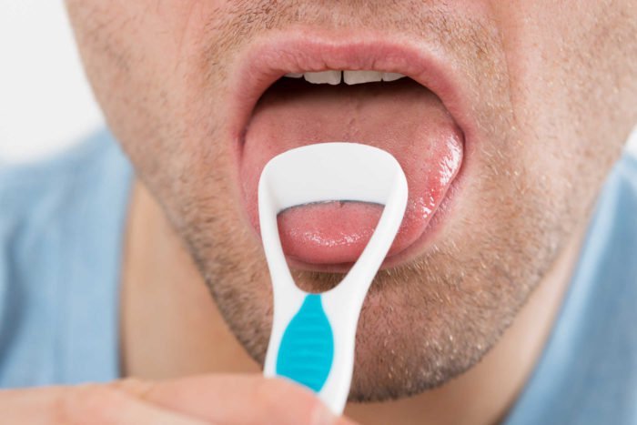 hoe de tong te reinigen